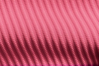Pembe kadife kumaşın tasarım amaçlı desenli arka plan olarak yakınlaştırılması
