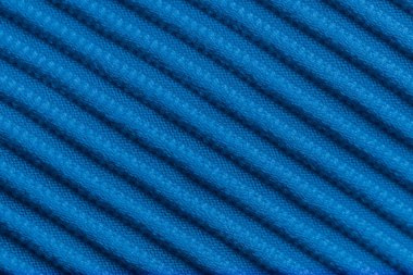 Tasarım amacı için mavi kadife kumaş desenli arka plan olarak yakın plan