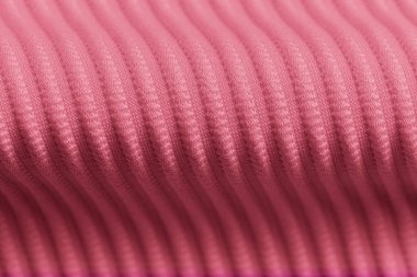 Pembe kadife kumaşın tasarım amaçlı desenli arka plan olarak yakınlaştırılması