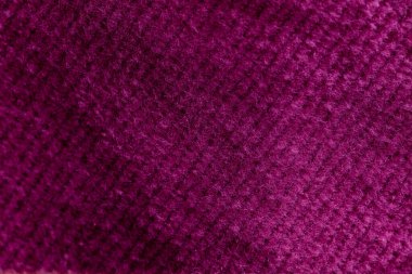 Pembe kadife kumaşın tasarım amaçlı desenli arka plan olarak yakınlaştırılması