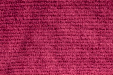 Pembe kadife kumaşın tasarım amaçlı desenli arka plan olarak yakınlaştırılması