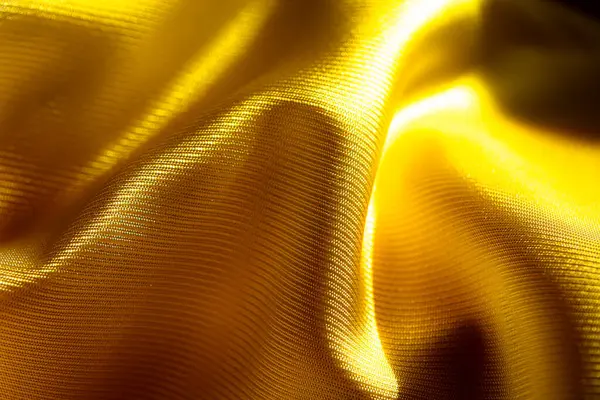 stock image yellow acetate fabric textured background for design purpose