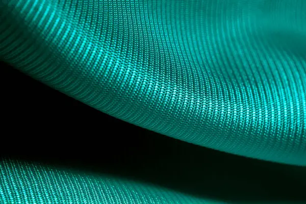 stock image turquoise acetate fabric textured background for design purpose