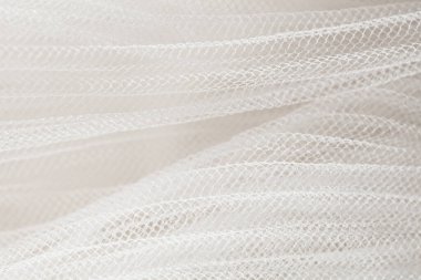 Tasarım amacı için beyaz kıvrımlı organza desenli arkaplanı kapat