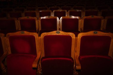 Row of red seats in theatre for design purpose