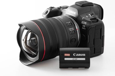 Lviv, Ukraine - August 18, 2024: Canon EOS R5 Mark II photocamera and Canon LP-E6P Li-Ion Battery clipart