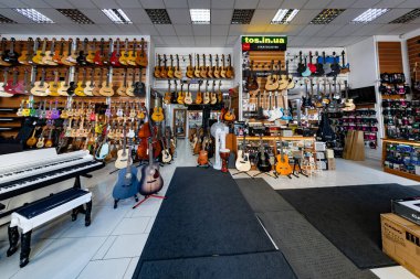 Lviv, Ukraine - August 27, 2024: Trembita musical instruments store interior clipart