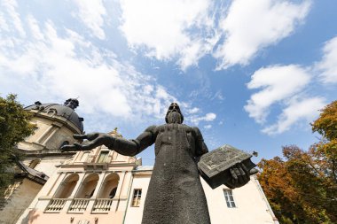 Lviv, Ukraine - August 27, 2024: Monument to Ivan  Fedorov in Lviv clipart