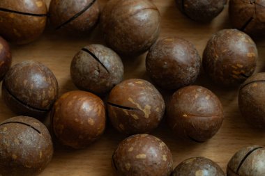 Tasarım amacı için soyulmamış macadamia fındık desenli arka plan