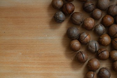 Tasarım amacı için soyulmamış macadamia fındık desenli arka plan