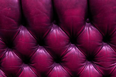 Closeup of pink diamond velour textured sofa background for design purpose clipart