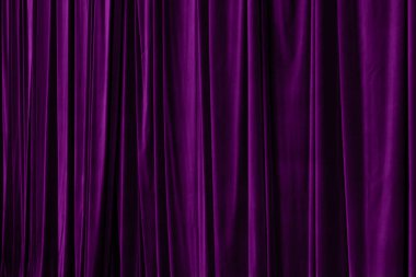 Purple curtain in theatre background for design purpose clipart