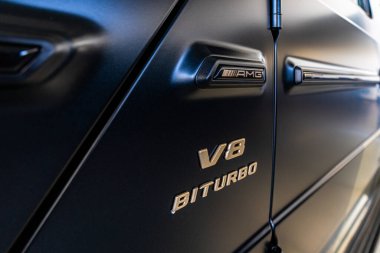 Lviv, Ukraine - November 26, 2024: Closeup of Mercedes-AMG G 63 V8 biturbo car clipart