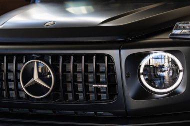 Lviv, Ukraine - November 26, 2024: Closeup of Mercedes-AMG G 63 V8 biturbo car clipart