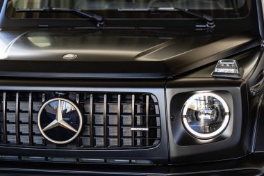 Lviv, Ukraine - November 26, 2024: Closeup of Mercedes-AMG G 63 V8 biturbo car clipart