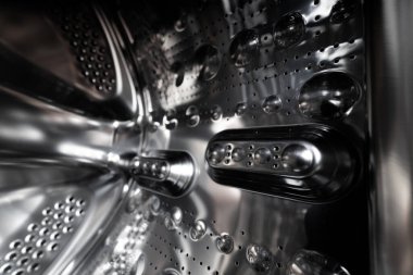 Bir çamaşır makinesi davulunun içinde, tasarım amacı için arkaplan