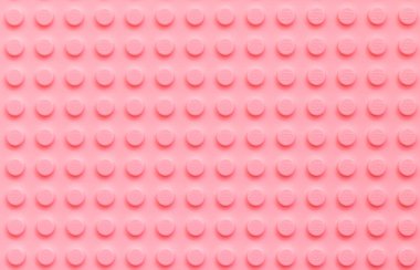 Lviv, Ukrayna - 4 Ocak 2025: LEGO Klasik plakasının pembe arka planı