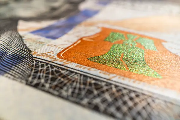 Tasarım amaçlı yeni 100 dolarlık banknotun bir parçası.