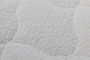 Döşeğin tekstil dokulu arkaplanının kapatılması