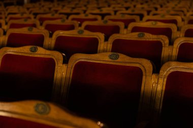 Row of red seats in theatre for design purpose