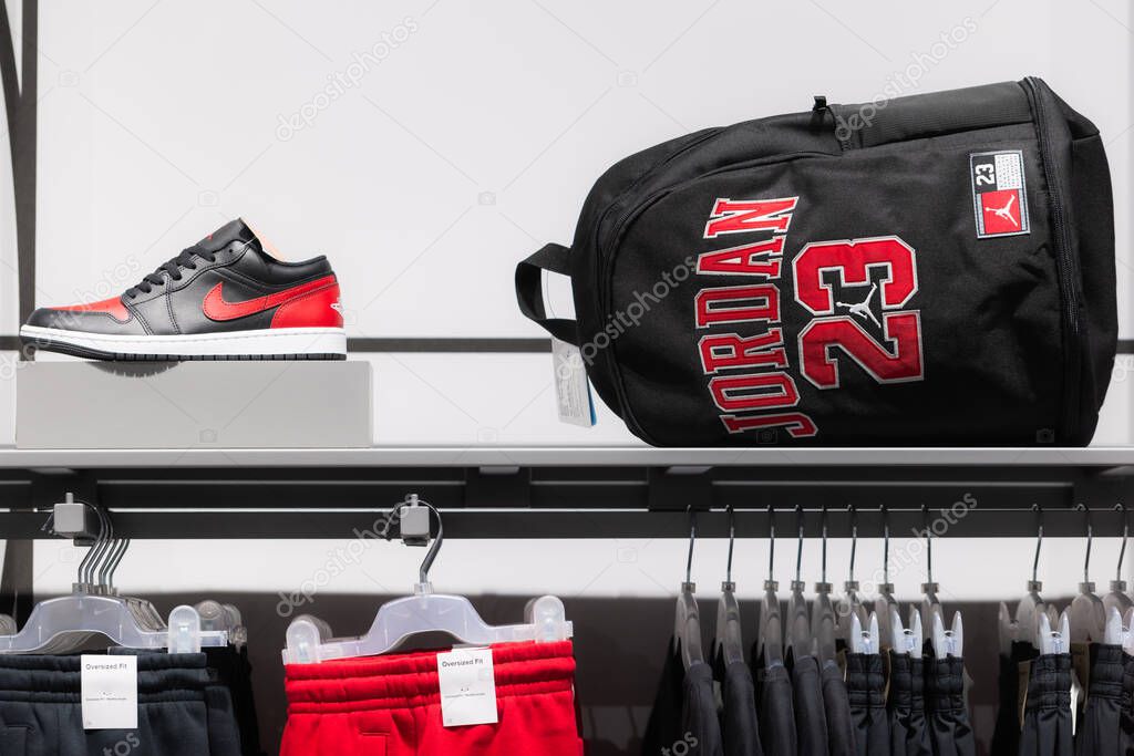 Lviv, Ukraine - May 30, 2025: Jordan Brand Display with Air Jordan 1 Low Sneaker and Backpack