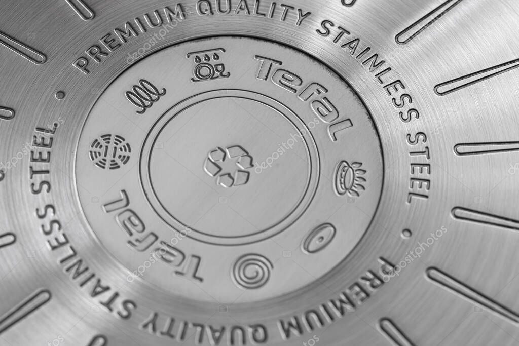 Lviv, Ukraine - August 16, 2025: Close-up of a Tefal Stainless Steel Pan Bottom