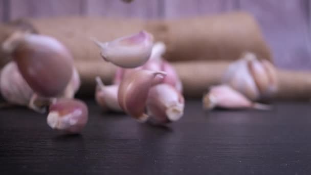 Fresh Garlic Clove Falling Black Background Raw Garlic One Most — Stock video