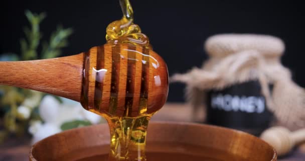 Honey Poured Spoon Wood Bowl Slow Motion Honey Contains Many — Stock Video