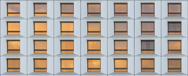 Geometric window building as abstract texture. Building windows pattern background. Building in Warsaw