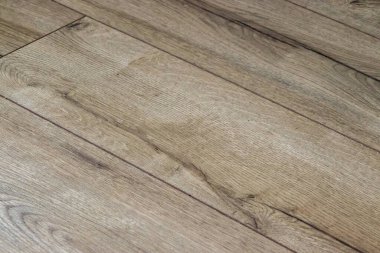 Floor panels background. old brown wooden floor diagonally. new hardwood floor.