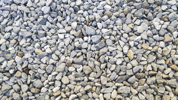 砂利道の石のテクスチャ 灰色の砂利のパターン 小さな岩で閉鎖道路 — ストック写真