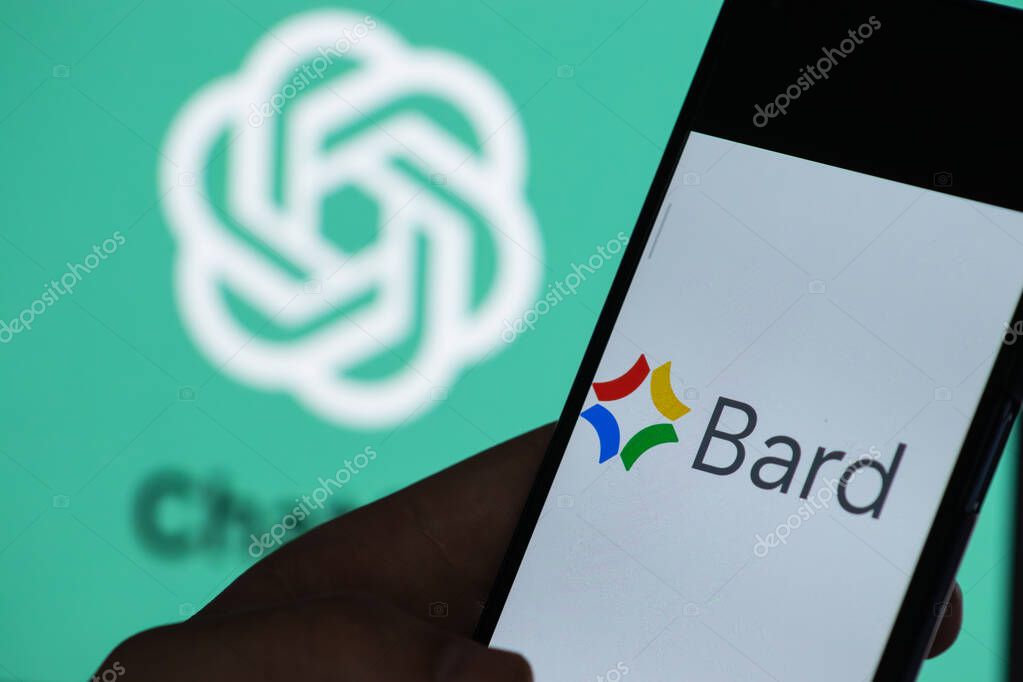 Warsaw Poland - July 24, 2023: Google Bard logo and Chat GPT on mobile device. AI chatbot technology