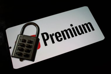 Warsaw Poland - September 20 2024: A close-up of a combination padlock resting on a premium membership card symbolizing security and access to exclusive content clipart