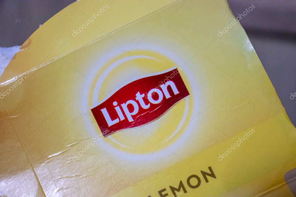 Warsaw Poland - January 19 2025: Close-up of Lipton tea packaging highlighting fresh lemon flavor. Ideal for beverage advertising and culinary uses.