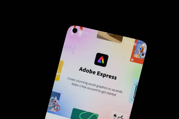 Varşova Polonya - 10 Mart 2025: Adobe Express uygulamasının grafik tasarım özelliklerini ve canlı renkleri gösteren bir akıllı telefon.