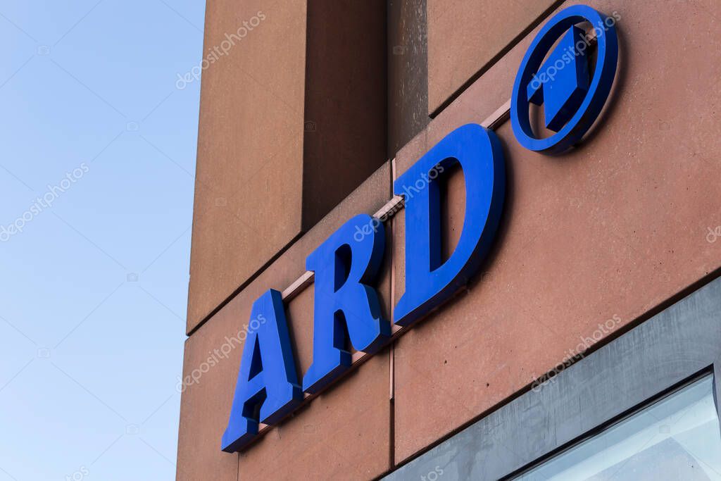 Berlin Germany - April 11 2025: Prominent ARD logo on a modern building facade against a clear blue sky symbolizing German media identity and culture.