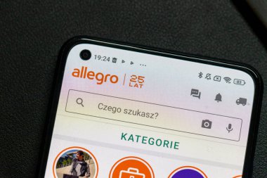 Warsaw Poland - September 16 2025: Close-up of a smartphone screen displaying the Allegro app. It shows categories and a search bar emphasizing online shopping.