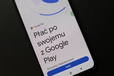 Warsaw Poland - September 24 2025: A smartphone display showing the Google Play app. The app promotes secure payment options for users to transact safely.