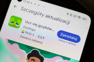Warsaw Poland - September 24 2025: Close-up of a smartphone screen displaying the Duolingo app update section emphasizing language learning and educational technology.