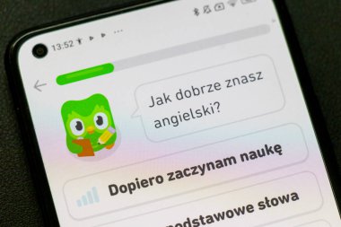 Warsaw Poland - September 24 2025: A smartphone screen displays Duolingo an app for language learning. The colorful interface encourages engagement and interactive practices.