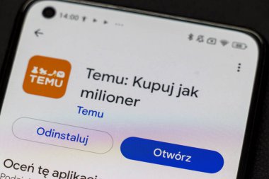 Warsaw Poland - September 24 2025: Close-up of a smartphone displaying the Temu mobile application interface featuring options to uninstall or open the app.