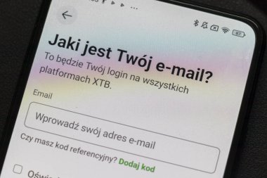 Warsaw Poland - September 24 2025: Close-up of a smartphone screen displaying email input prompt for XTB platform registration showcasing modern technology.