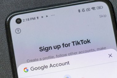 Warsaw Poland - September 24 2025: Close-up of a smartphone screen displaying the TikTok sign-up page highlighting social media engagement opportunities and digital connectivity.