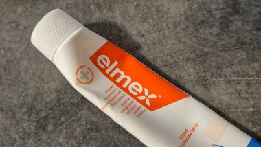 Warsaw Poland - September 24 2025: Close-up of a tube of Elmex toothpaste emphasizing dental hygiene and oral health care.