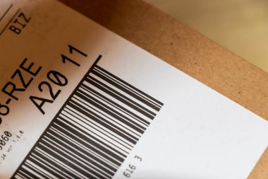 Warsaw Poland - September 24 2025: Close-up of a shipping label featuring a barcode and identification numbers highlighting logistics and delivery processes.
