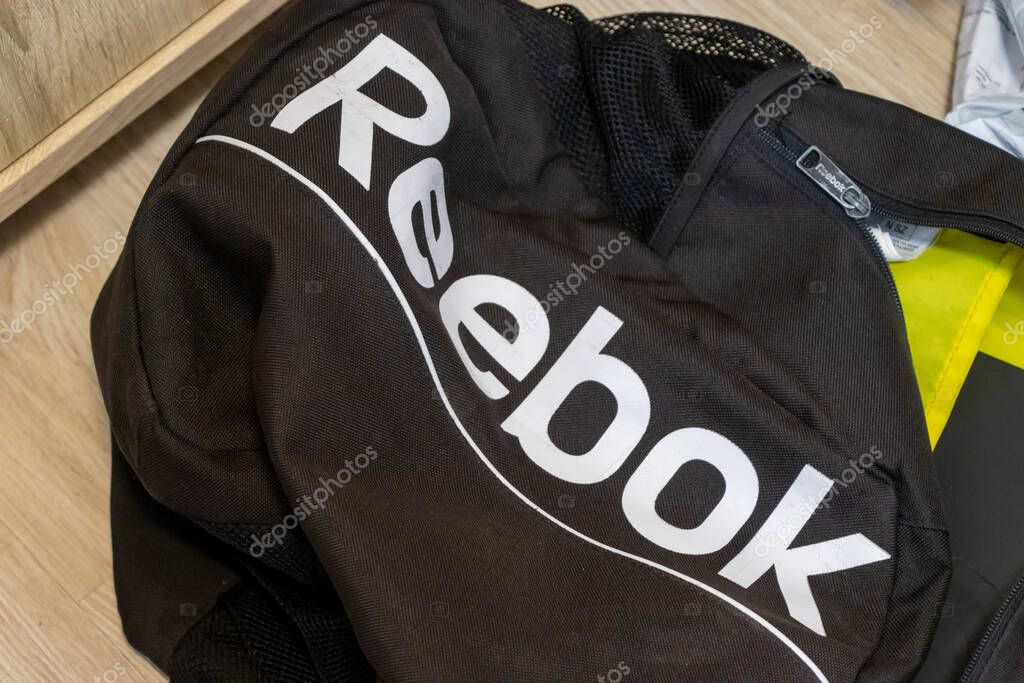 Warsaw Poland - September 24 2025: A close-up view of a black sports bag featuring the Reebok logo designed for fitness enthusiasts and athletes seeking functionality and style.