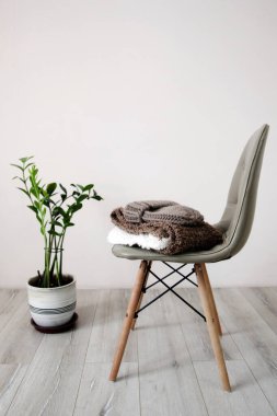 balls of woolen threads and knitwear