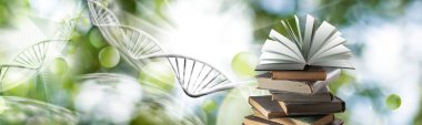 DNA zincirlerinin, uçan topların ve ışık parıltılarının stilize edilmiş bir görüntüsü karşısında bir yığın kitabın ve açık bir kitabın resmi.