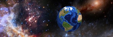 Kozmik bir manzaranın arka planına karşı uzayda Dünya 'nın görüntüsü