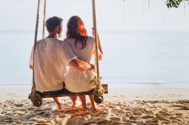 couple on beach holidays, family romantic honeymoon vacation  clipart